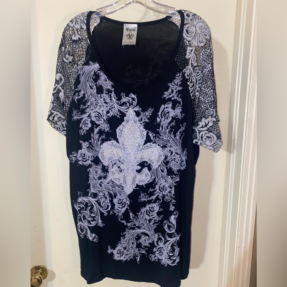 Black sweater with white fleur de lis